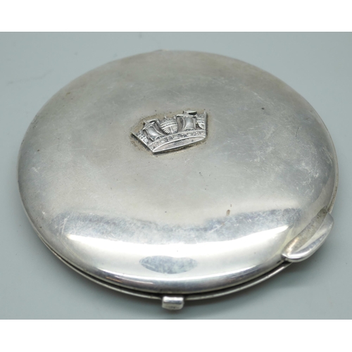 7347 - A silver compact with crown/sailing ship detail to lid, Birmingham 1934