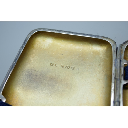 7348 - A silver cigarette case, inscribed on the lid, 77g, 6cm x 8cm