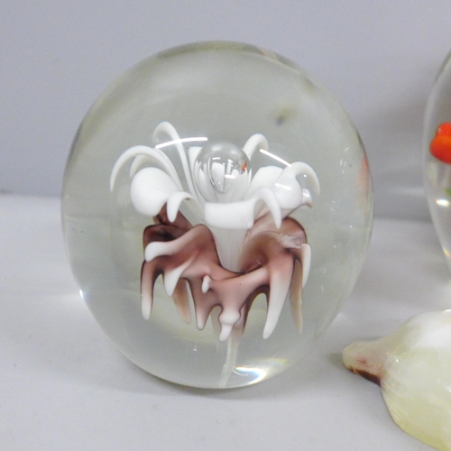 2015 - Three glass paperweights and two onyx tortoise