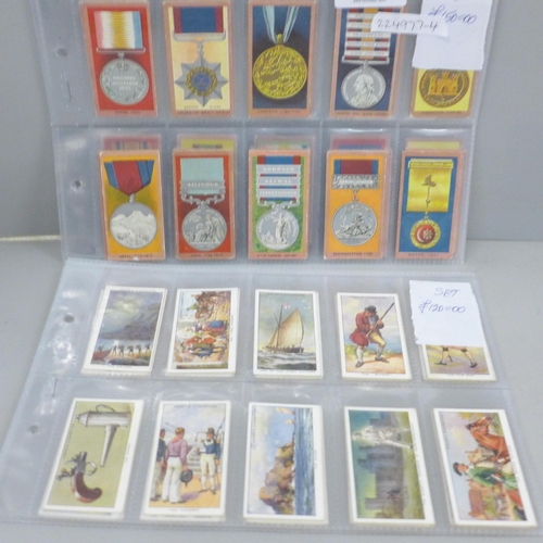 2021 - Two sets of cigarette cards, Wills Medals and Ogdens Smugglers and Smuggling, catalogue value £270