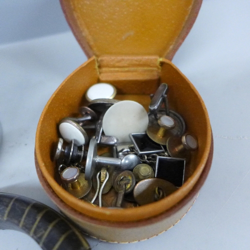 2084 - A collection of costume jewellery including a pair of silver West German cufflinks