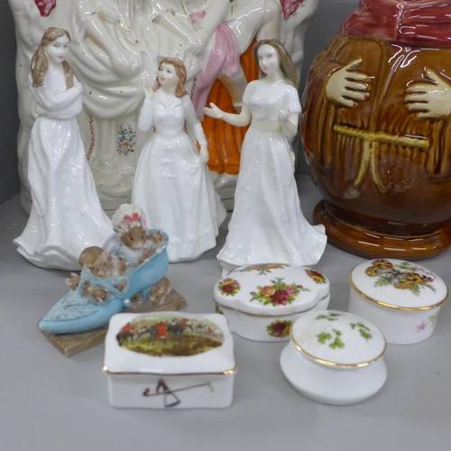 2109 - A collection of ceramics including Royal Doulton and Staffordshire spaniels and flatback, a Bunnykin... 