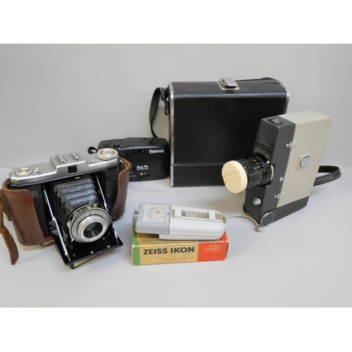 2143 - A selection of photographic equipment including Netar camera and leather case, a Sankyo Super 8-cm v... 