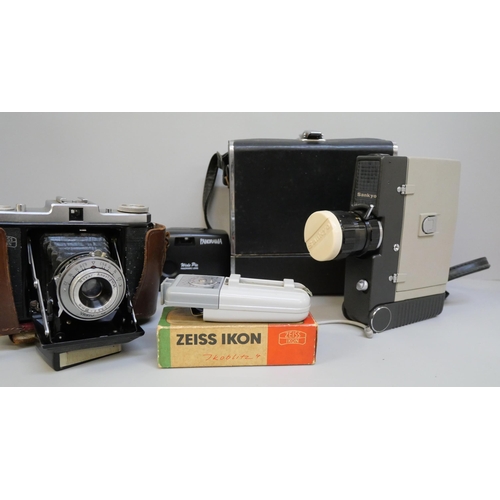 2143 - A selection of photographic equipment including Netar camera and leather case, a Sankyo Super 8-cm v... 