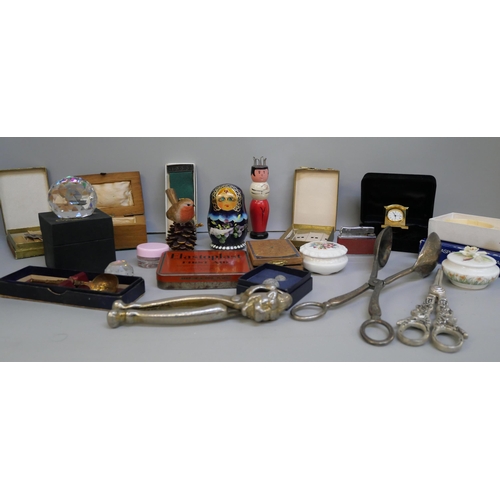 2149 - A pair of nutcrackers, crystal paperweight, grape scissors, driving medal and other items