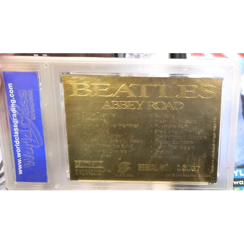 2162 - The Beatles, publications and a 1996 Sportstime 23 Karat gold Abbey Road album cover, limited editio... 