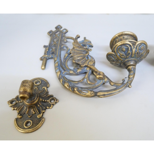 2163 - A set of brass sconce candle holders