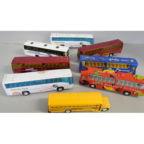 2176 - Eight die-cast model buses and two Weetabix lorries, boxed