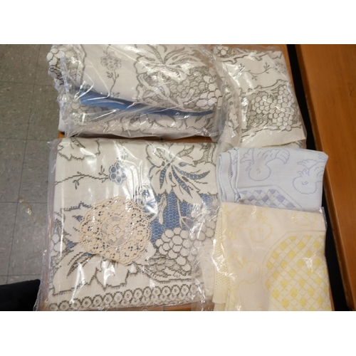 2191 - A quantity of genuine Nottingham lace; two very large tablecloths, a bedspread and other lace