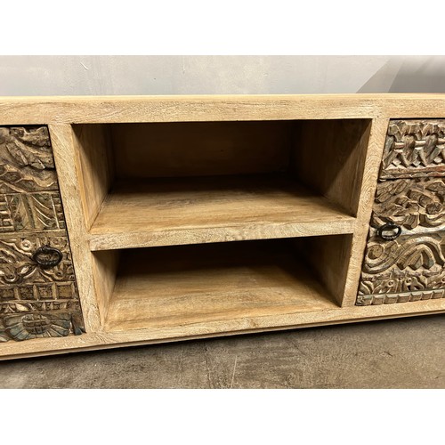 3041 - A wooden TV cabinet with a sandblast antique white lime finish