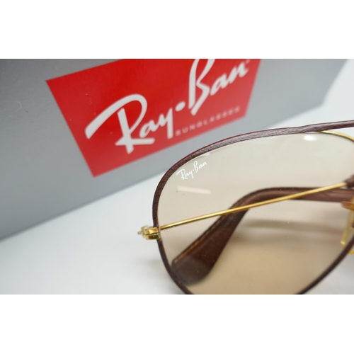 2206 - A pair of Ray-Ban leather mounted aviator style sunglasses, unisex