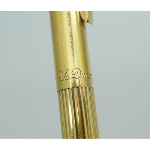 2207 - A Dupont silver gilt pen, a/f mechanism