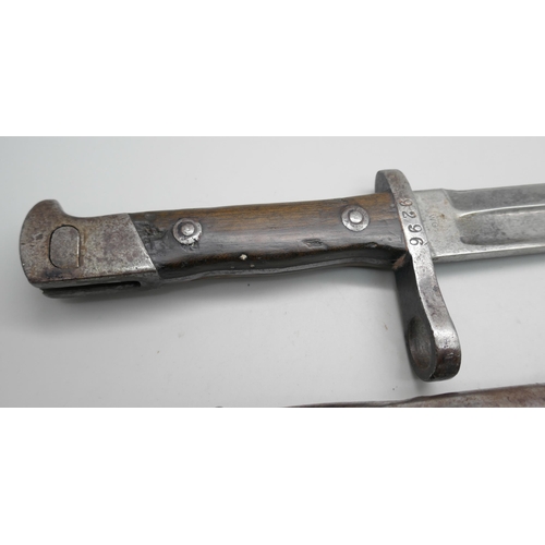 2222 - A World War I German Mauser bayonet with scabbard, 9296, the blade marked WG