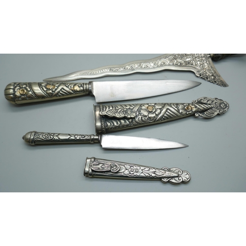 2223 - Three letter openers, a Kris, one marked Mexico and one with scabbard marked Alpaca Argentina, and a... 