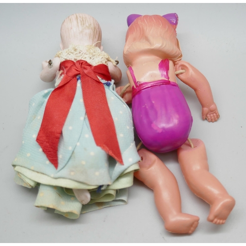 2229 - A small doll and a later celluloid doll marked Japan