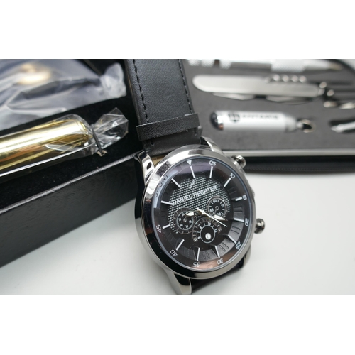 2230 - A boxed Phillipe Reveur wristwatch, pen and wallet set, a Daniel Hechter wristwatch and an Antaris t... 