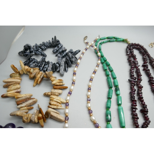 2232 - Gemstone necklaces and bracelets including garnet, coral, malachite, etc.