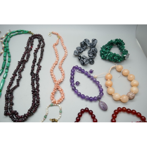 2232 - Gemstone necklaces and bracelets including garnet, coral, malachite, etc.