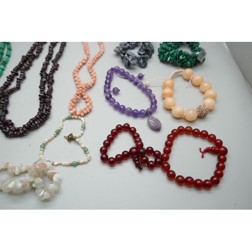 2232 - Gemstone necklaces and bracelets including garnet, coral, malachite, etc.