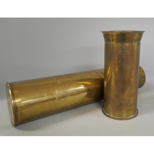 2244 - A World War II aircraft engine starter cartridge and a shell case