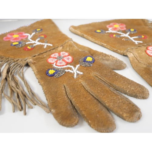 2252 - A pair of Native American beaded leather gloves/gauntlets