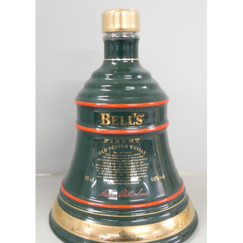 2265 - Three Wade Bells Whiskey Christmas decanters, 91, 93, 97, with contents