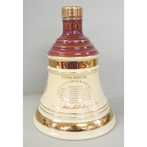 2265 - Three Wade Bells Whiskey Christmas decanters, 91, 93, 97, with contents