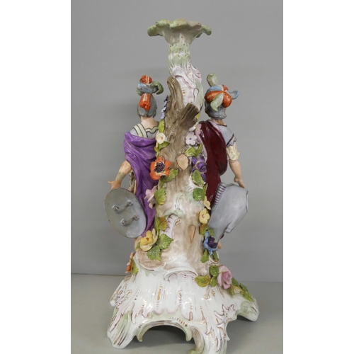 2272 - A German porcelain figural candlestick, a/f