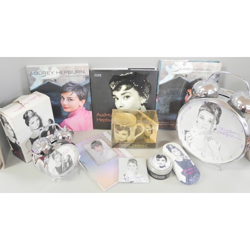 2289 - A collection of Audrey Hepburn items including two clocks, books, etc.