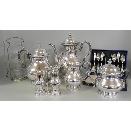 2290 - A four piece plated tea service and a collection of flatware, etc.