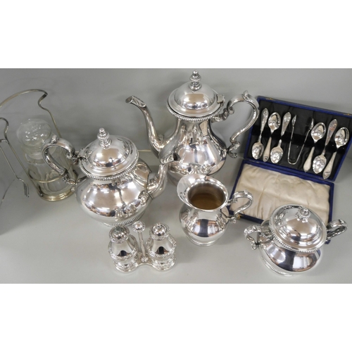 2290 - A four piece plated tea service and a collection of flatware, etc.