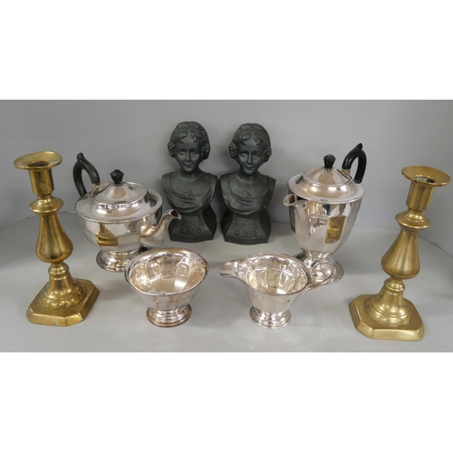 2300 - A pair of cast iron fire dog busts, a pair of brass candlesticks and a collection of A1 plated ware