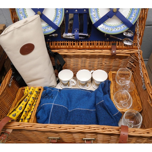 2311 - A vintage wicker picnic hamper and contents