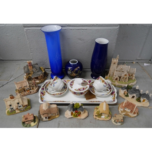 2317 - A collection of eleven Lilliput Lane Cottages and Church plus a Limoges tea set, two blue vases and ... 