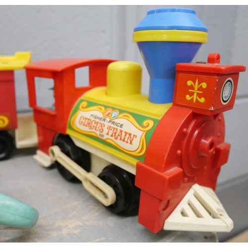 2329 - A collection of vintage Fisher Price toys