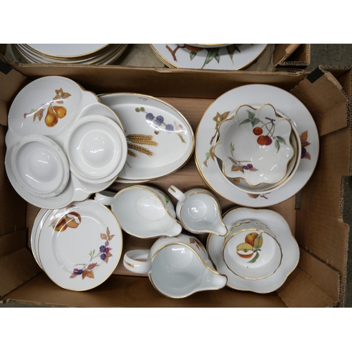 2338 - A large collection of Royal Worcester Evesham kitchenware including a dinner service, gravy boat, cu... 