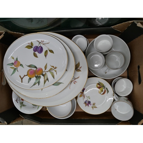 2338 - A large collection of Royal Worcester Evesham kitchenware including a dinner service, gravy boat, cu... 