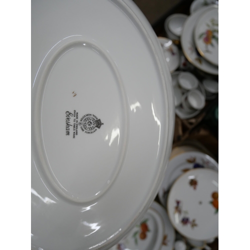 2338 - A large collection of Royal Worcester Evesham kitchenware including a dinner service, gravy boat, cu... 