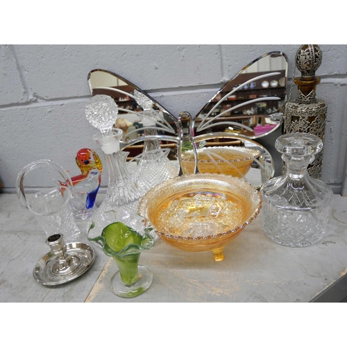 2344 - Glass including a Murano dish, a coloured glass dog figure, decanter, glasses, a butterfly mirror, c... 