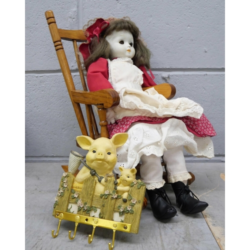 2348 - A Victoria Impex Corporation model of a clown, boxed, a doll on rocking chair and four large resin f... 