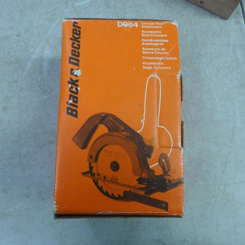 5004 - A Black & Decker D420 2 speed drill and press and box including circular saw attachment, never used,... 