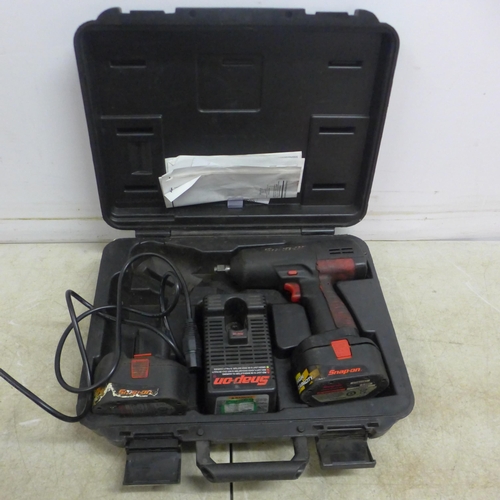 5032 - A Snap-On cordless impact wrench with 2 batteries and charger