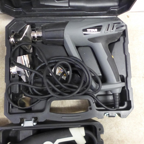 5067 - 2 Titan Heat Guns, cased, plus a Titan 600W hammer drill, unused