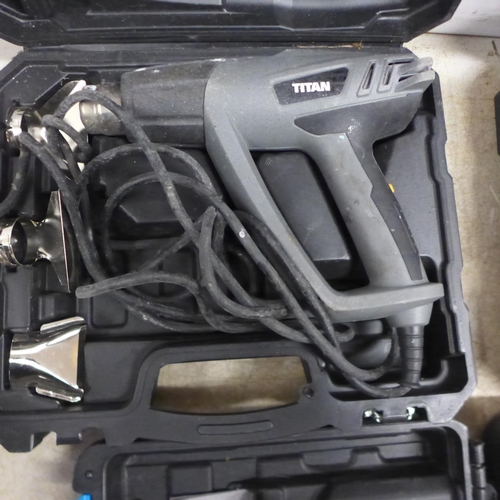 5067 - 2 Titan Heat Guns, cased, plus a Titan 600W hammer drill, unused