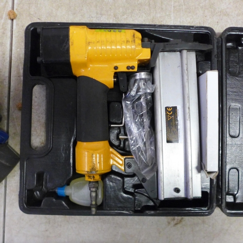 5068 - A box of assorted tools including a JCB AANG-1 Air nail gun, 1/2 