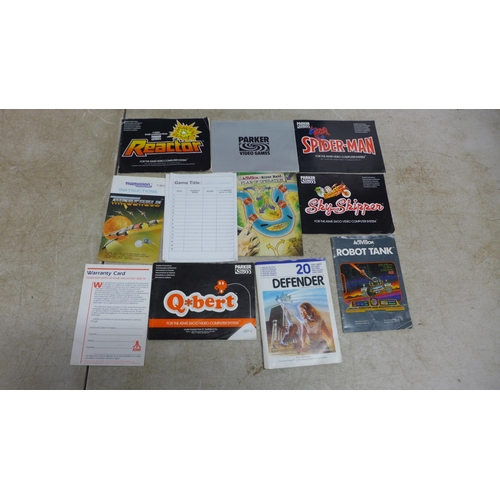 5089 - An Atari 2600 Vader games console with controllers, manuals and 9 games including Spiderman, Amidar,... 