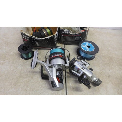 5092 - 4 fishing reels including a Shakespeare Omni 070, Daiwa long cast, Ryobi GR3 and a Daiwa AG4000B