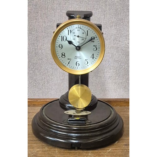 298 - An American Poole glass domes electro magnetic bakelite clock