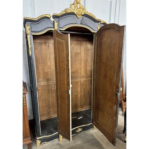 210 - A French style black and gilt painted armoire and a black painted double bed