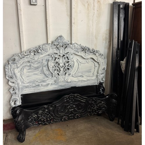 210 - A French style black and gilt painted armoire and a black painted double bed